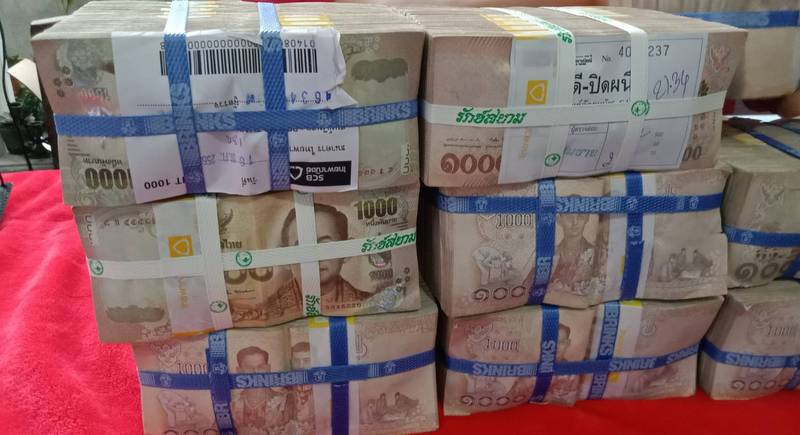 Житель Пхукета выиграл 18 млн бат в лотерею. Фото: Иккапоп Тхонгтуб